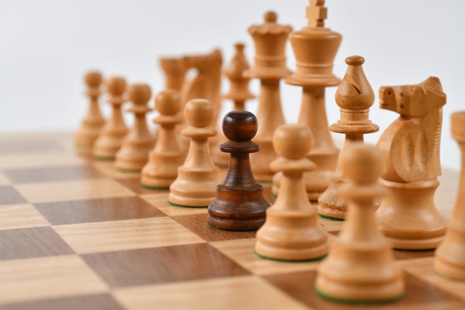 Chess pieces on the board — strategy before confrontation