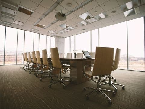 The conference table where the timetable of a case is set
