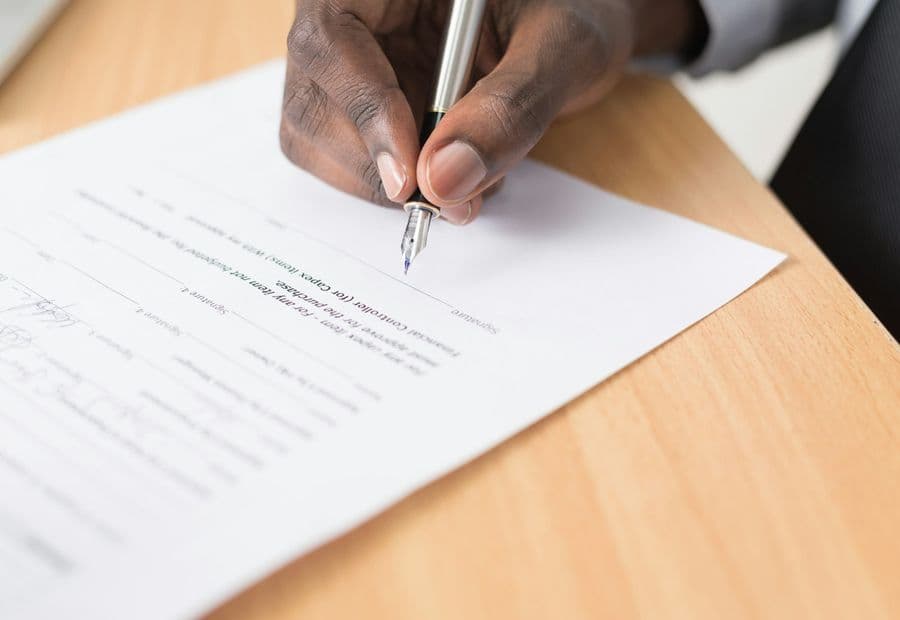 Signing the terms of a settlement agreement